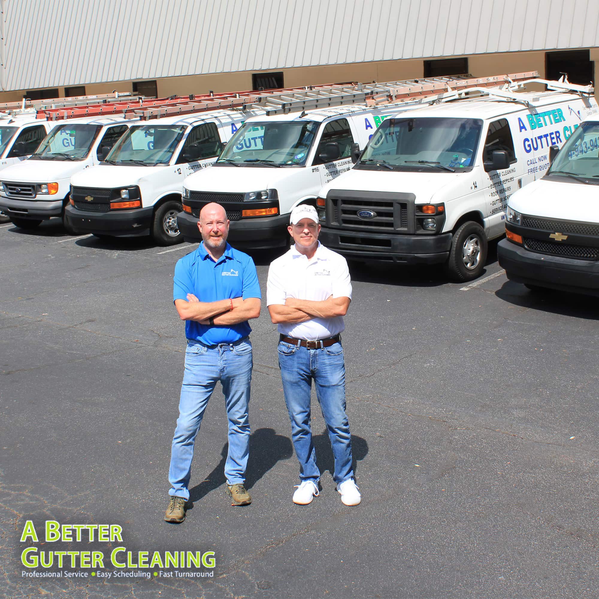 Fleet Business owners 3-square Two men standing in front of a truck.